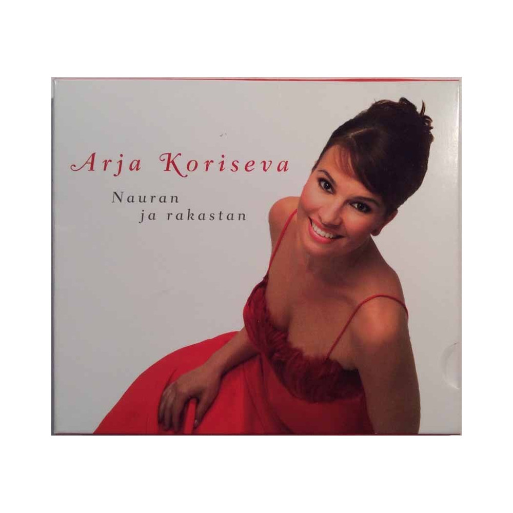 Koriseva Arja Käytetty CD-levy Nauran Ja Rakastan  kansi EX levy VG+ Käytetty CD