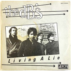 dB’s vinyylisingle Living a lie / Up's and downs  kansi VG+ levy VG+ käytetty vinyylisingle PS