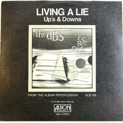 dB’s vinyylisingle Living a lie / Up's and downs  kansi VG+ levy VG+ käytetty vinyylisingle PS