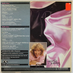 Fältskog Agnetha 1983 MILS-4650 Wrap your arms around me Begagnat LP