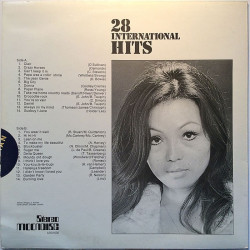Tuntemattomia artisteja: 28 International Hits III  kansi VG+ levy EX Käytetty LP