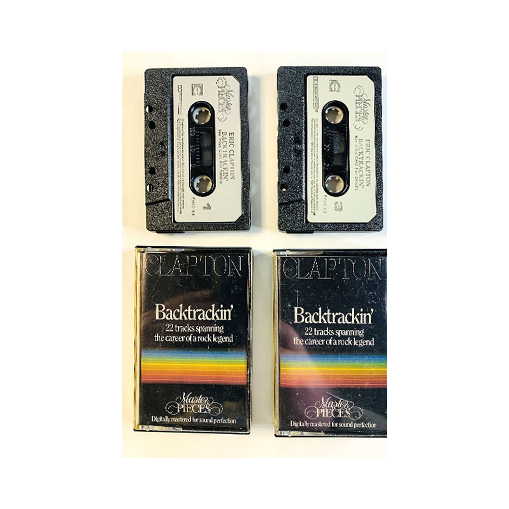 Clapton Eric: Backtrackin’ 2 kasettia osat 1 & 2 kansipaperi EX , musiikkikasetin kunto EX kasetti