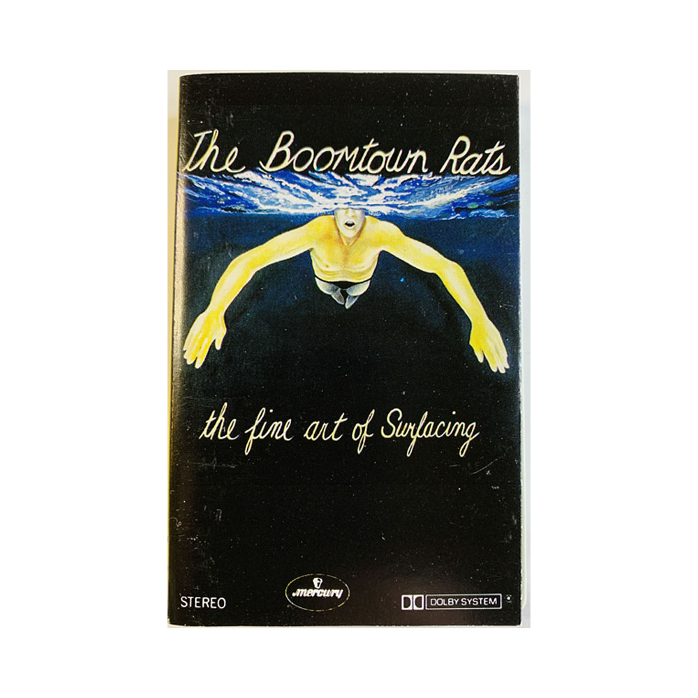 Boomtown Rats: The fine art of Surfacing kansipaperi EX- , musiikkikasetin kunto EX kasetti