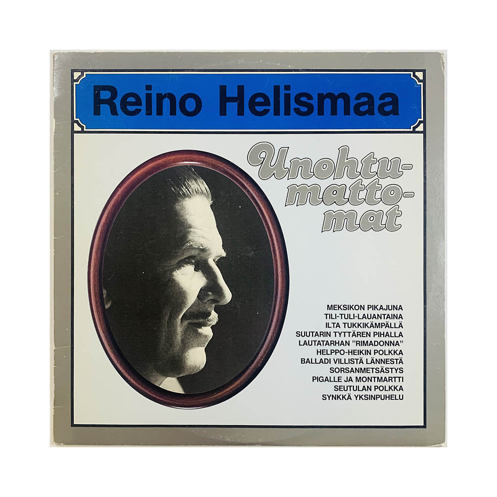 Helismaa Reino LP Unohtumattomat  kansi VG+ levy VG+ Käytetty LP