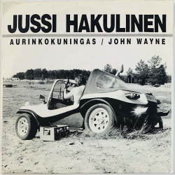 Hakulinen Jussi vinyl single Aurinkokuningas / John Wayne  kansi VG+ levy EX käytetty vinyylisingle PS
