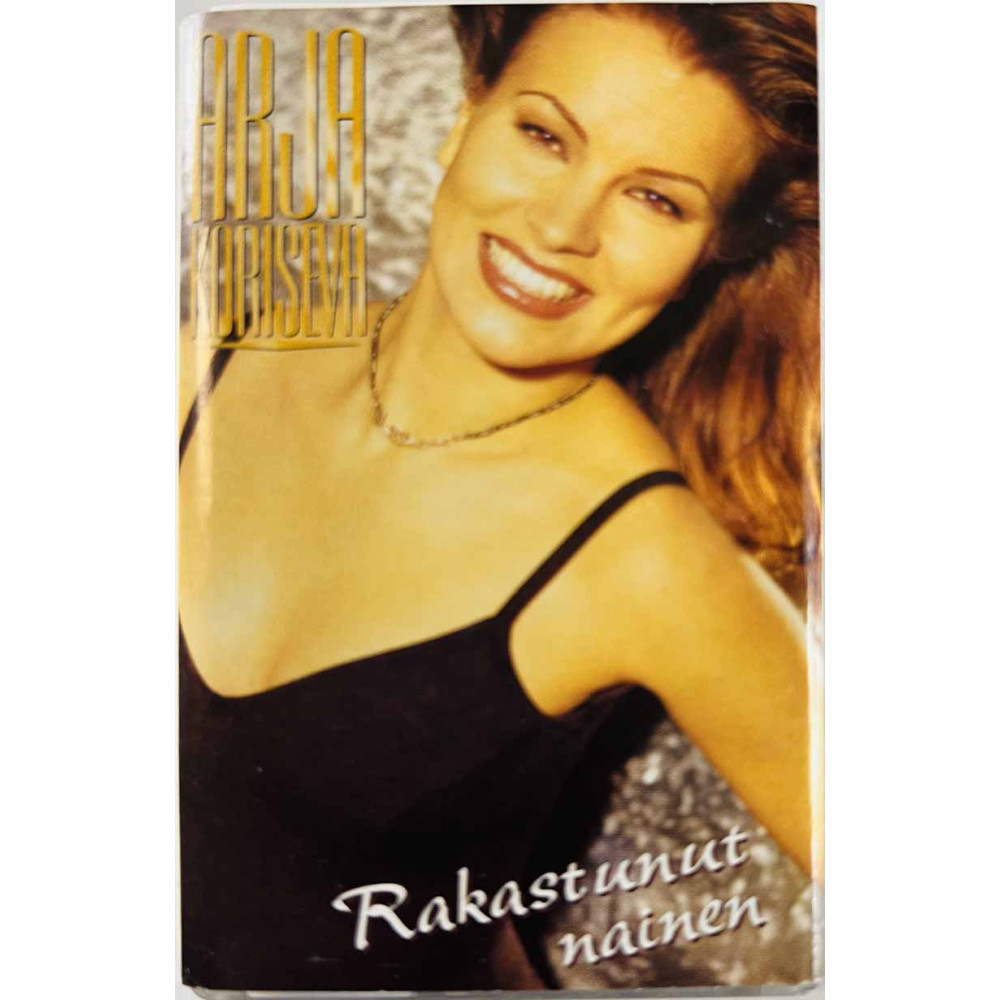 Koriseva Arja: Rakastunut nainen kansipaperi EX , musiikkikasetin kunto EX käytetty kasetti
