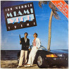 Hammer Jan käytetty 7” kuvakannella Miami Vice theme / TV version  kansi VG+ levy EX käytetty vinyylisingle PS