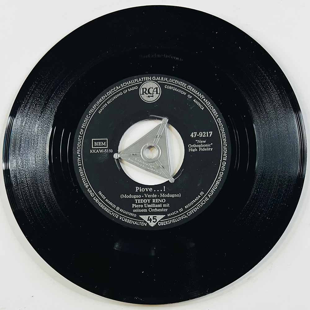 Reno Teddy Käytetty 7” ei kuvakantta Piove...! / Li’ per li’  kansi Ei kuvakantta levy VG käytetty vinyylisingle