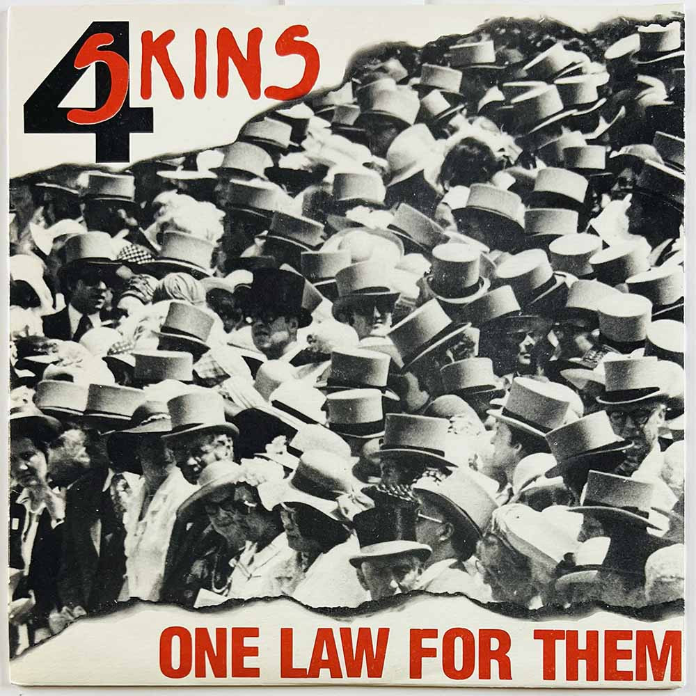 4 Skins käytetty 7” kuvakannella One law for them / Brave new world  kansi EX levy VG käytetty vinyylisingle PS