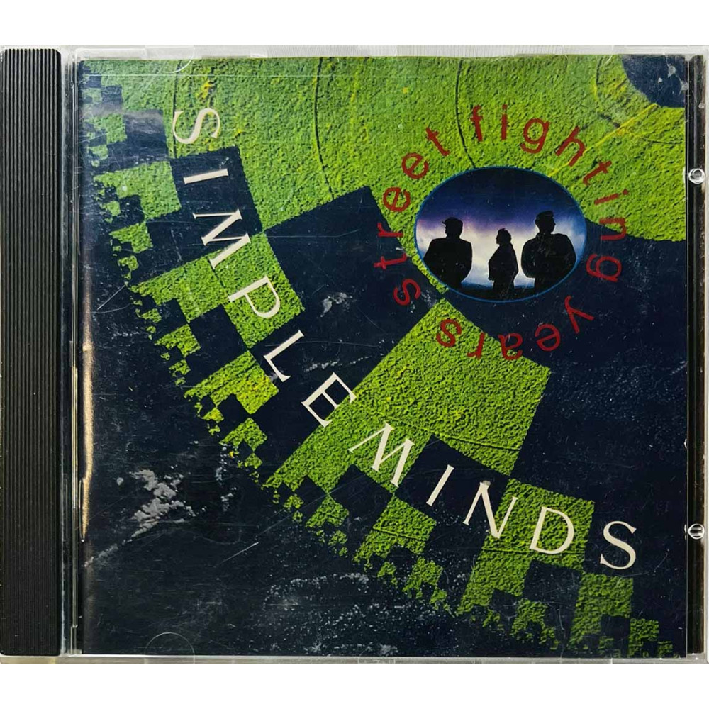 Simple Minds CD Street Fighting Years  kansi EX levy EX- Käytetty CD