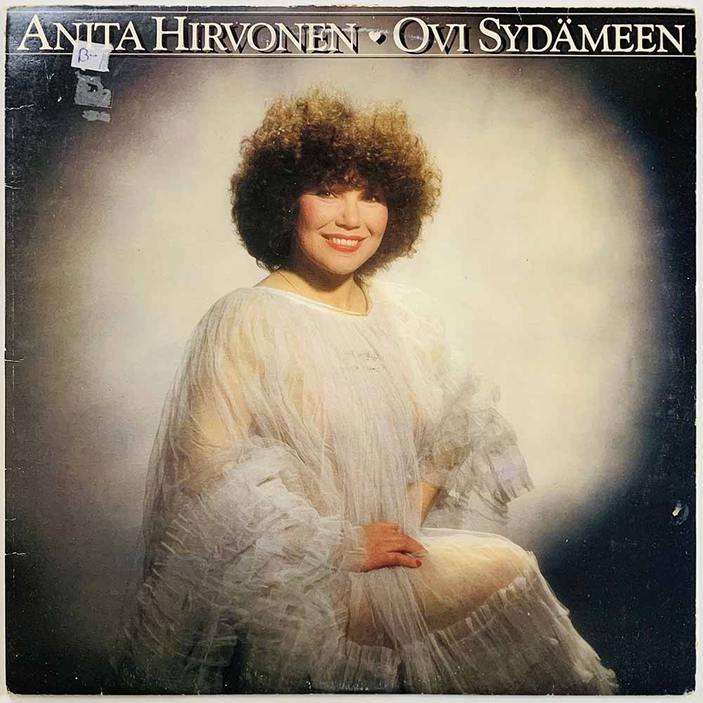 Hirvonen Anita LP Ovi sydämeen  kansi VG levy EX- Käytetty LP