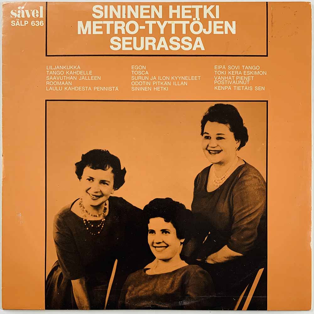 Metro-Tytöt LP Sininen hetki Metro-Tyttöjen seurassa  kansi VG+ levy EX- Käytetty LP