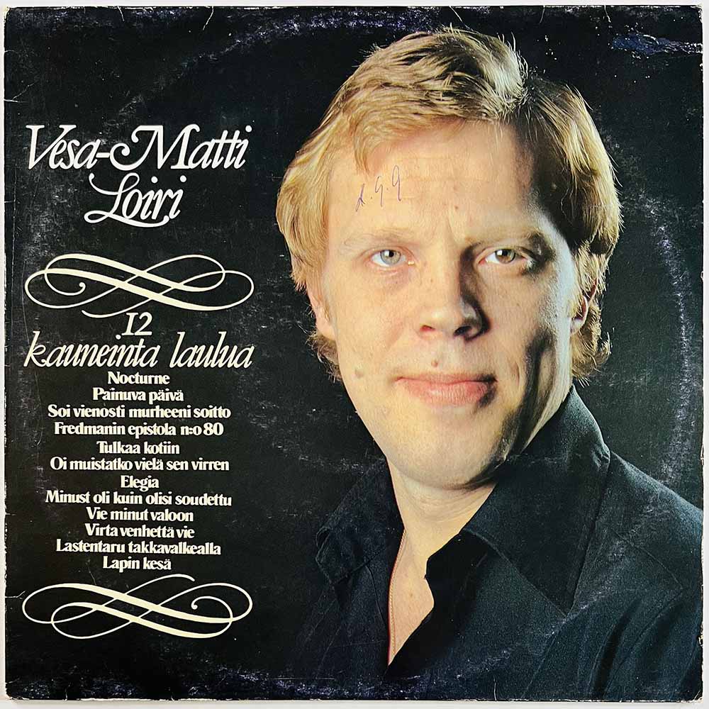 Loiri Vesa-Matti LP 12 kauneinta laulua  kansi VG levy EX Käytetty LP