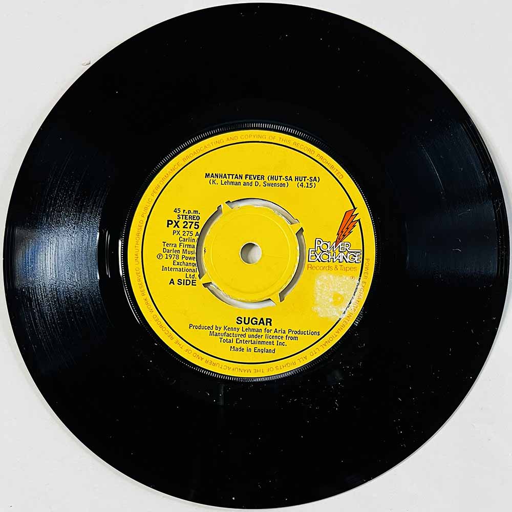 Sugar Käytetty 7” ei kuvakantta Manhattan Fever  kansi Ei kuvakantta levy EX käytetty vinyylisingle