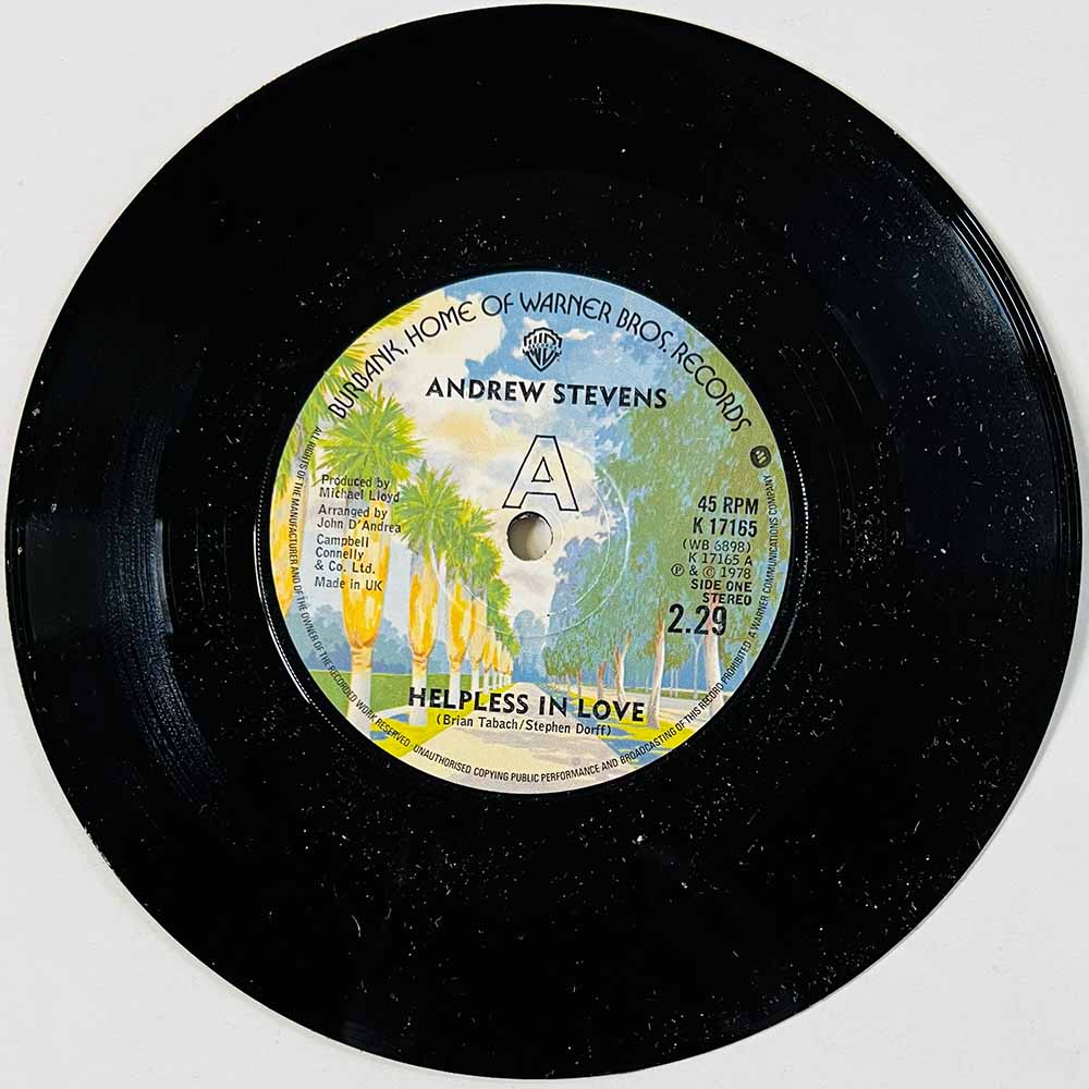 Andrew Stevens Käytetty 7” ei kuvakantta Helpless In Love  kansi Ei kuvakantta levy EX käytetty vinyylisingle