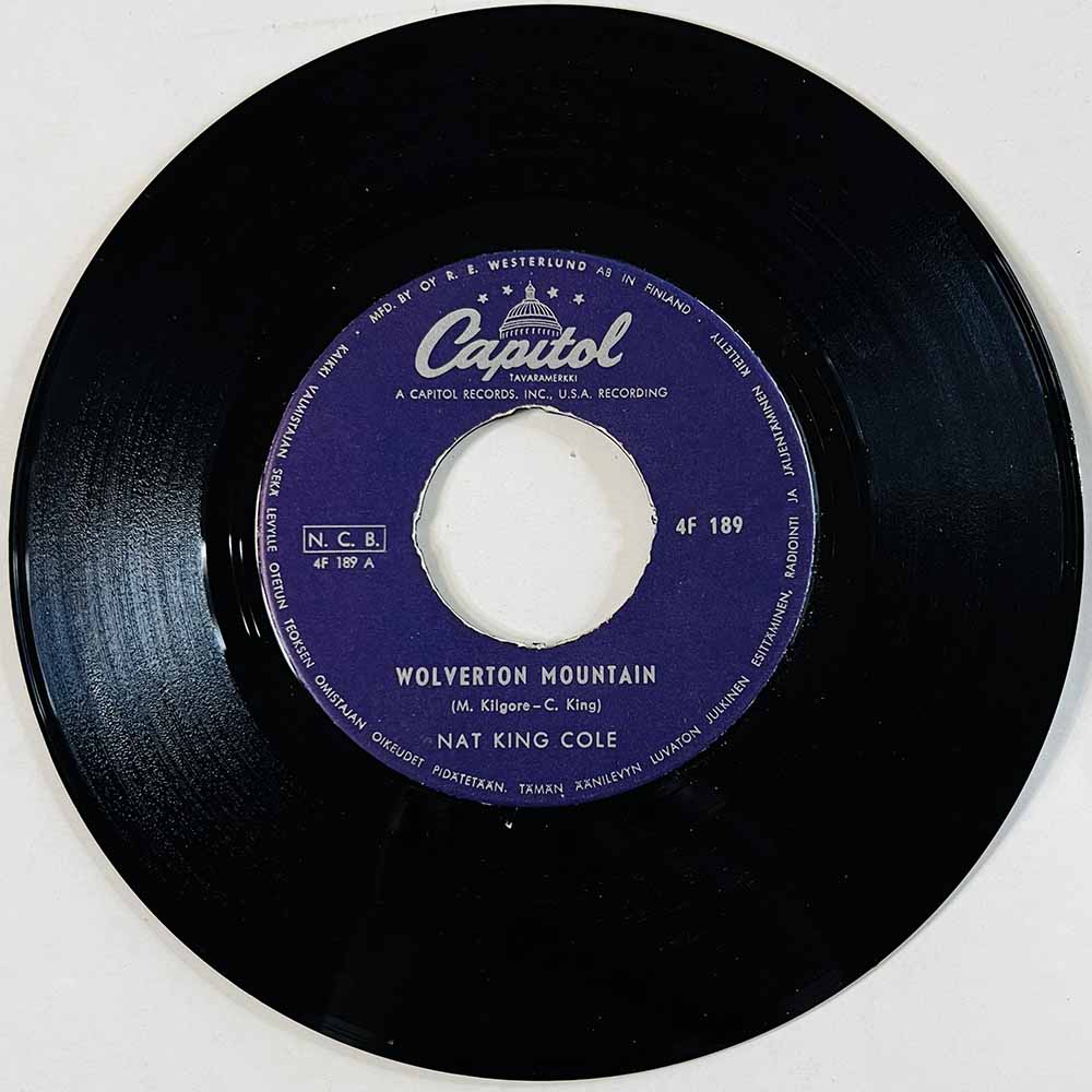 Nat King Cole Käytetty 7” ei kuvakantta Wolverton Mountain  kansi Ei kuvakantta levy VG+ käytetty vinyylisingle