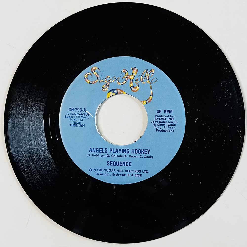 Sequence Käytetty 7” ei kuvakantta Angels Playing Hookey  kansi Ei kuvakantta levy EX käytetty vinyylisingle