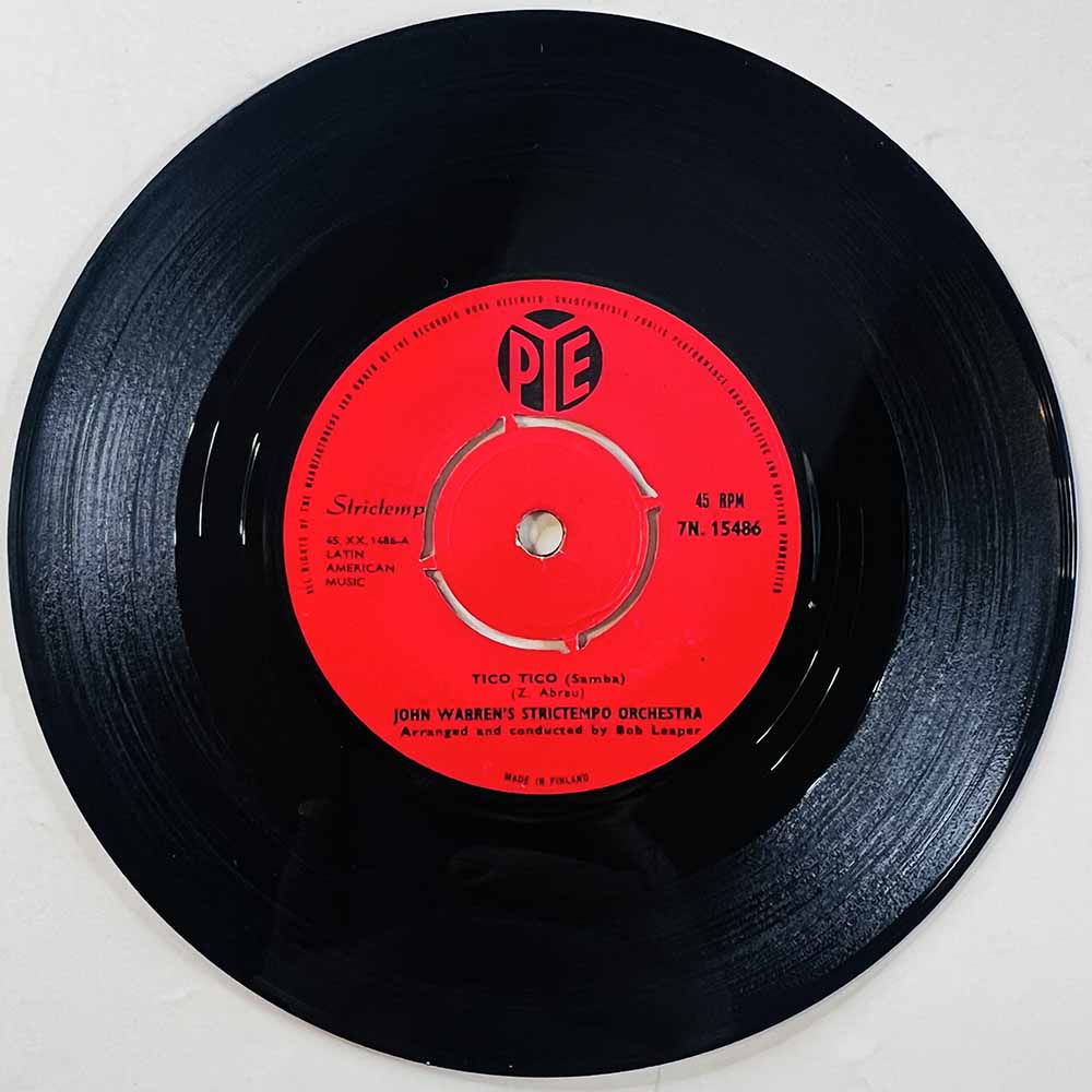 John Warren's Strictempo Combo Käytetty 7” ei kuvakantta Tico Tico / El Cumbanchero  kansi Ei kuvakantta levy VG+ käytetty vinyy