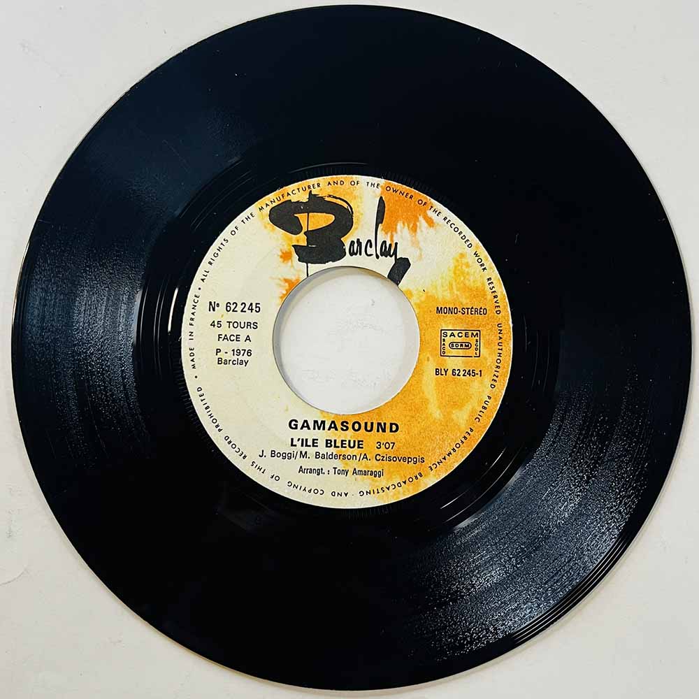 Gamasound Käytetty 7” ei kuvakantta L'Ile Bleue  kansi Ei kuvakantta levy VG käytetty vinyylisingle