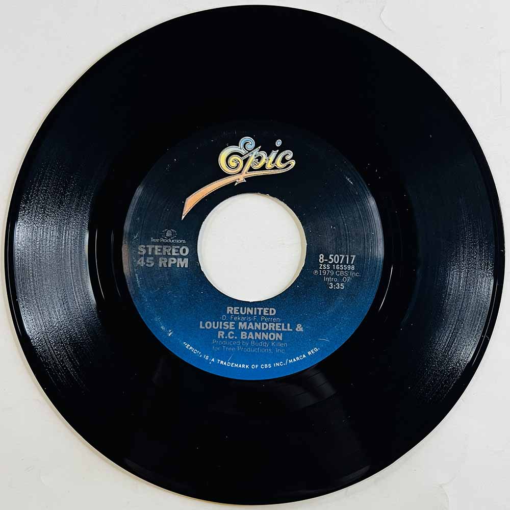 Louise Mandrell & R.C. Bannon 1979 8-50717 Reunited begagnad singelskiva