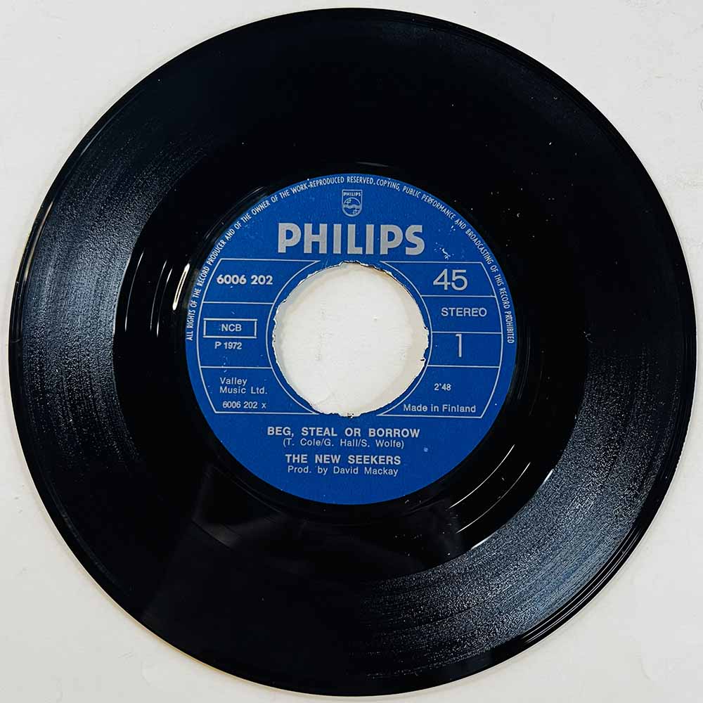 New Seekers Käytetty 7” ei kuvakantta Beg, Steal Or Borrow / Sing Out  kansi Ei kuvakantta levy Very Good (VG) käytetty vinyylis