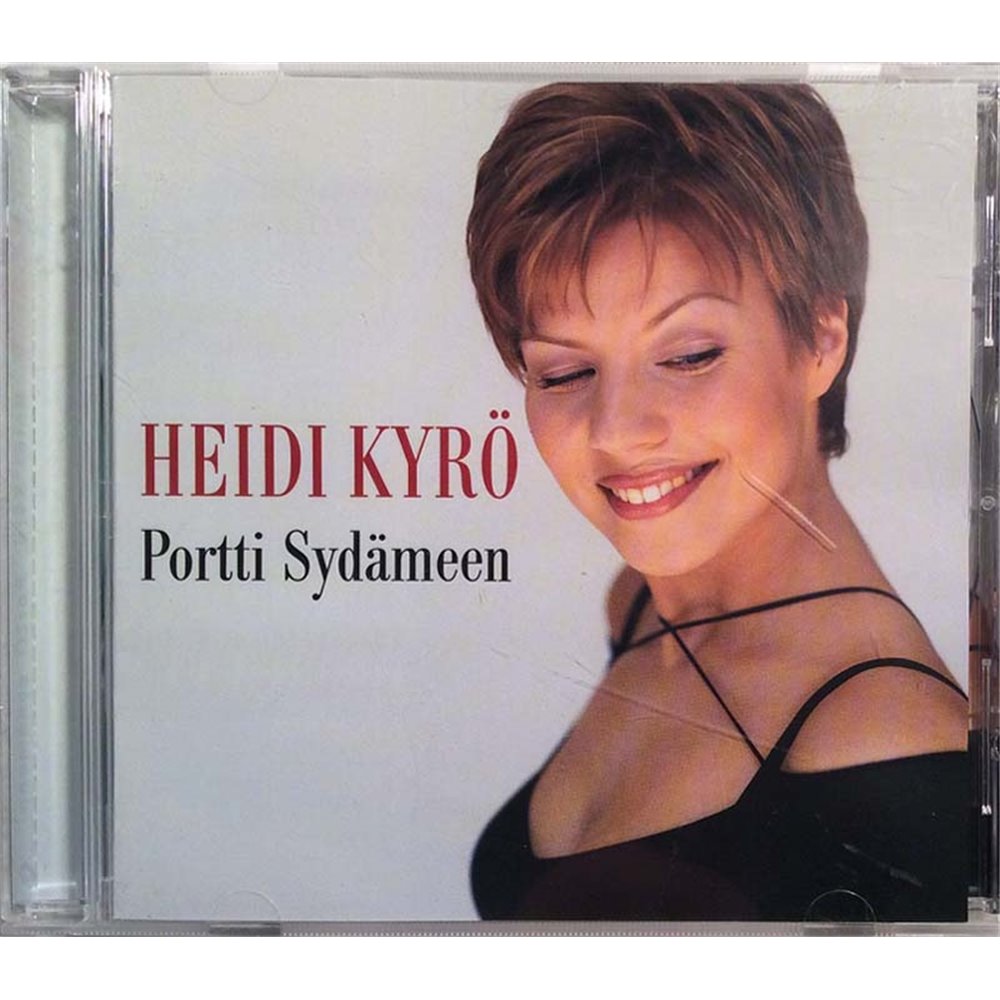 Kyrö Heidi CD Portti Sydämeen  kansi EX levy EX Käytetty CD