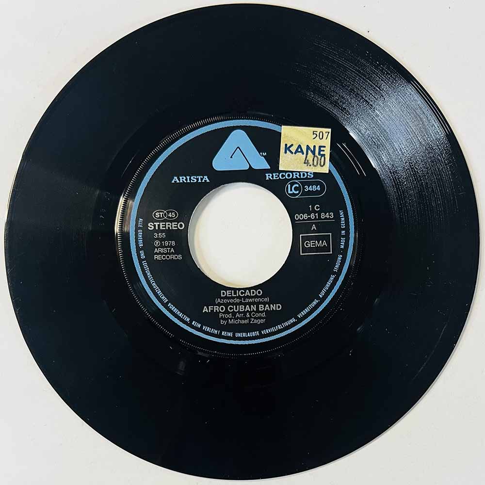 Afro Cuban Band Käytetty 7” ei kuvakantta Delicado / You're Like  kansi Ei kuvakantta levy VG- käytetty vinyylisingle