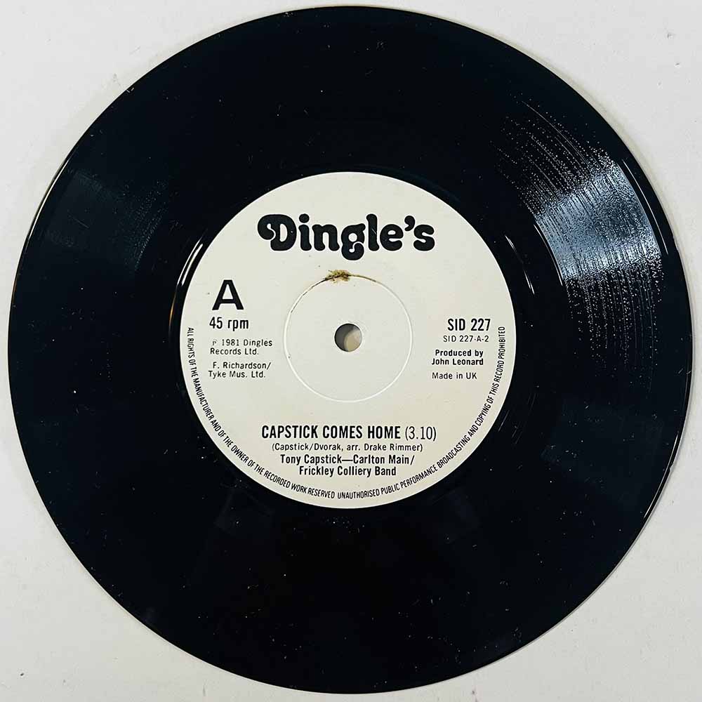 Capstick Tony - Carlton Colliery Band 1981 SID 227 Capstick Comes Home / The Sheffield Grinder begagnad singelskiva