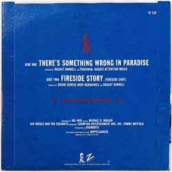 Kid Creole And The Coconuts vinyylisingle There's something wrong in paradise / Fireside Story  kansi EX- levy EX käytetty vinyy