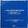 Kid Creole And The Coconuts vinyylisingle There's something wrong in paradise / Fireside Story  kansi EX- levy EX käytetty vinyy