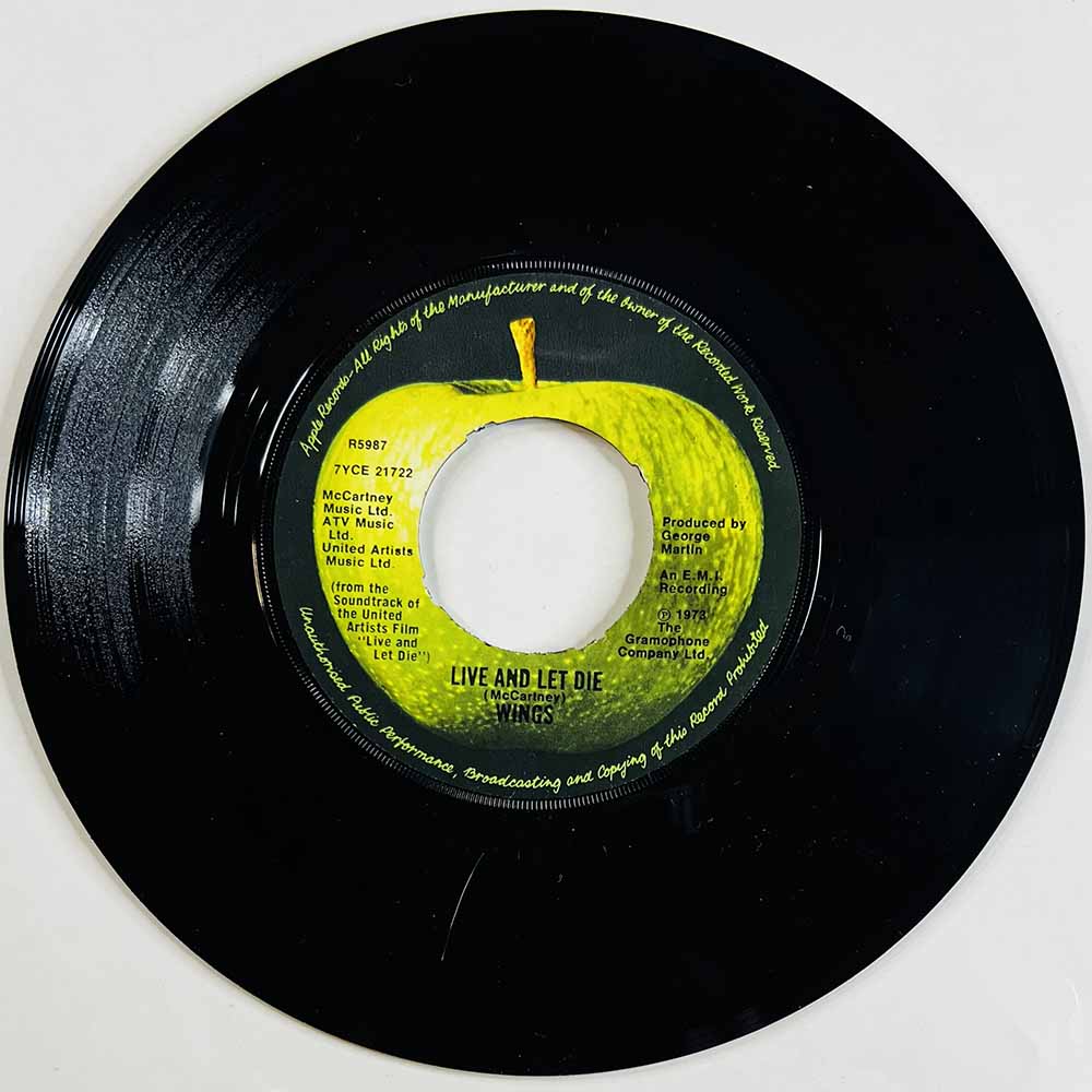 Wings 1973 R5987 Live And Let Die / I Lie Around begagnad singelskiva