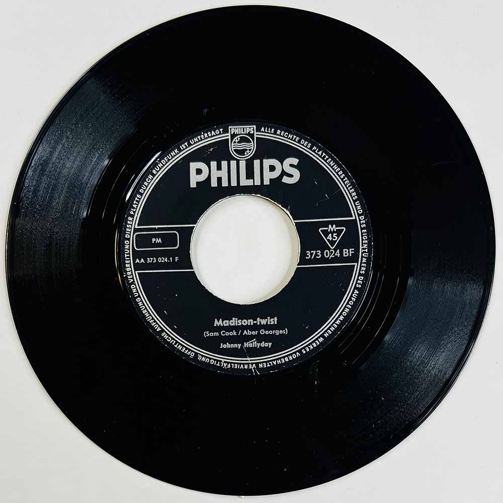 Hallyday Johnny Käytetty 7” ei kuvakantta Madison-twist / Dans un jardin D'amour  kansi Ei kuvakantta levy G+ käytetty vinyylisi