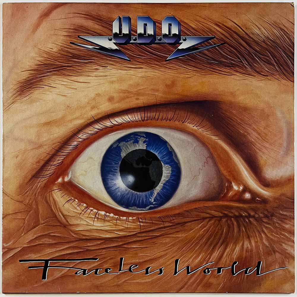 U.D.O. LP Faceless World  kansi EX- levy EX Käytetty LP