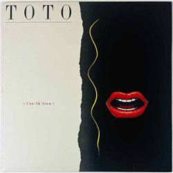 Toto LP Isolation  kansi EX levy EX Käytetty LP