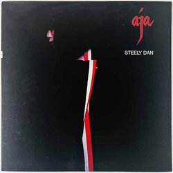 Steely Dan LP Aja, red vinyl  kansi EX levy EX Käytetty LP