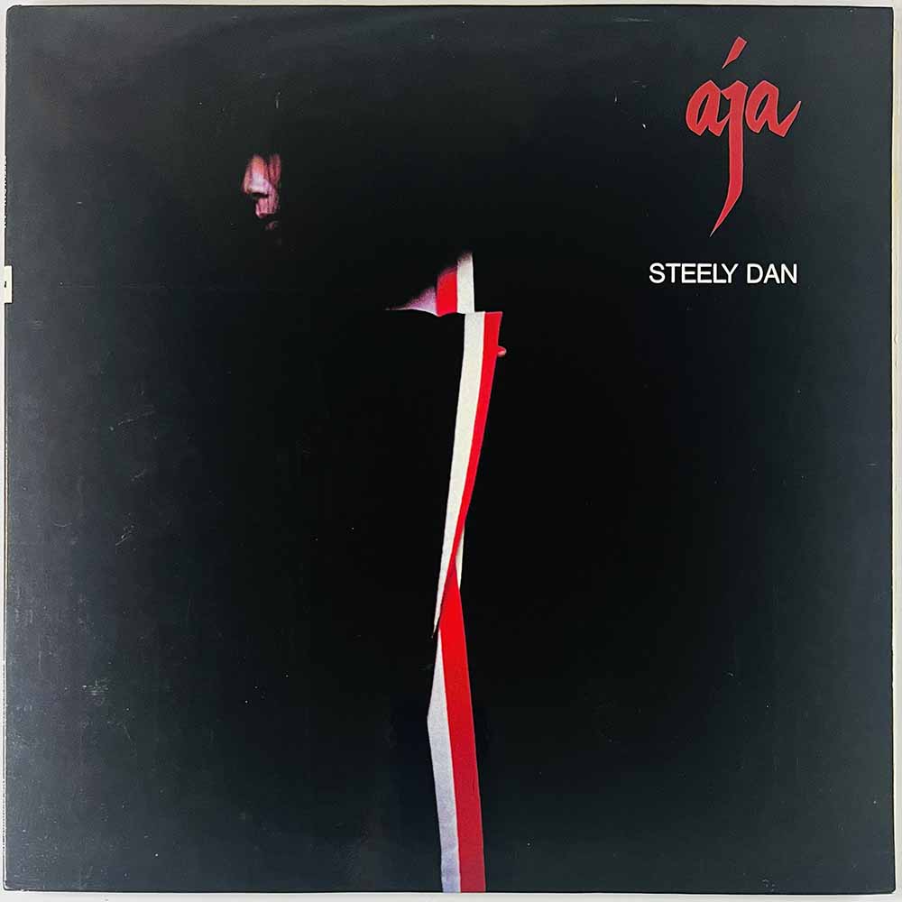 Steely Dan LP Aja, red vinyl  kansi EX levy EX Käytetty LP