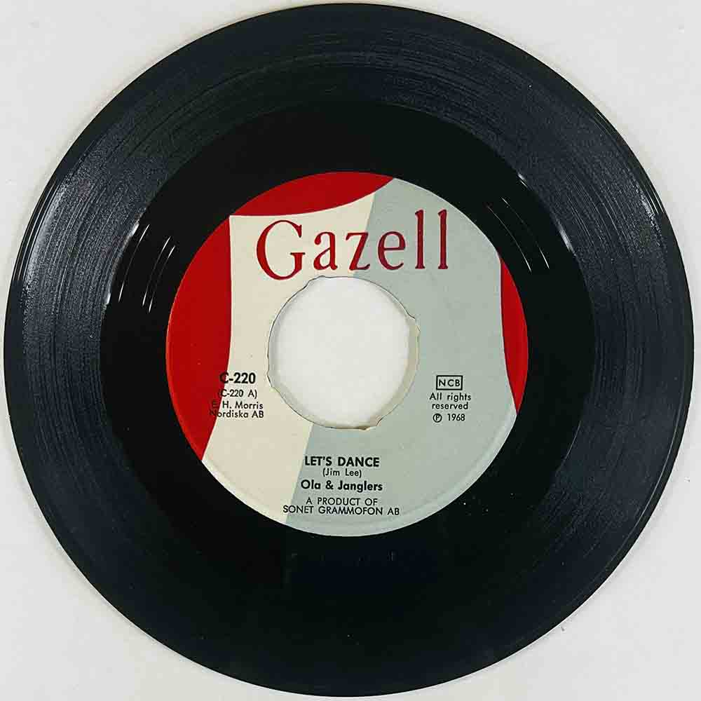Ola & Janglers Käytetty 7” ei kuvakantta Let's dance / Hear me  kansi Ei kuvakantta levy EX- vinyylisingle