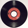 O’Malley Leonore : First be a woman / Put a rainbow in your heart - begagnad singelskiva